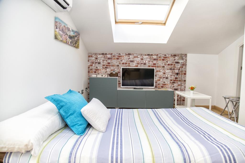 Apartamentos Momas La Casa De Mama Малага Экстерьер фото